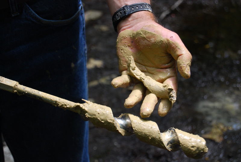 A soil auger is a helpful tool for sampling soils below the surface. A layer of clay-rich soil may be found under the top layer of organic soil in a vernal pool. A clay layer helps pools hold water longer. soil auger Credit: Sally Ray